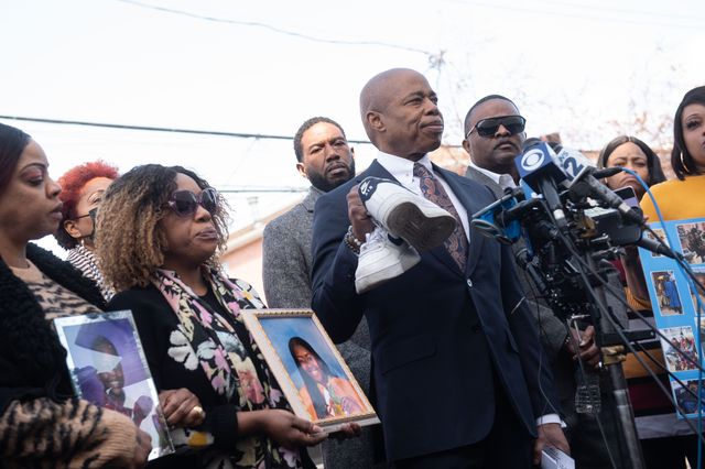 Mayor Eric Adams at a news conference with the family of 12-year-old Kade Lewin, who was fatally shot last week in East Flatbush.